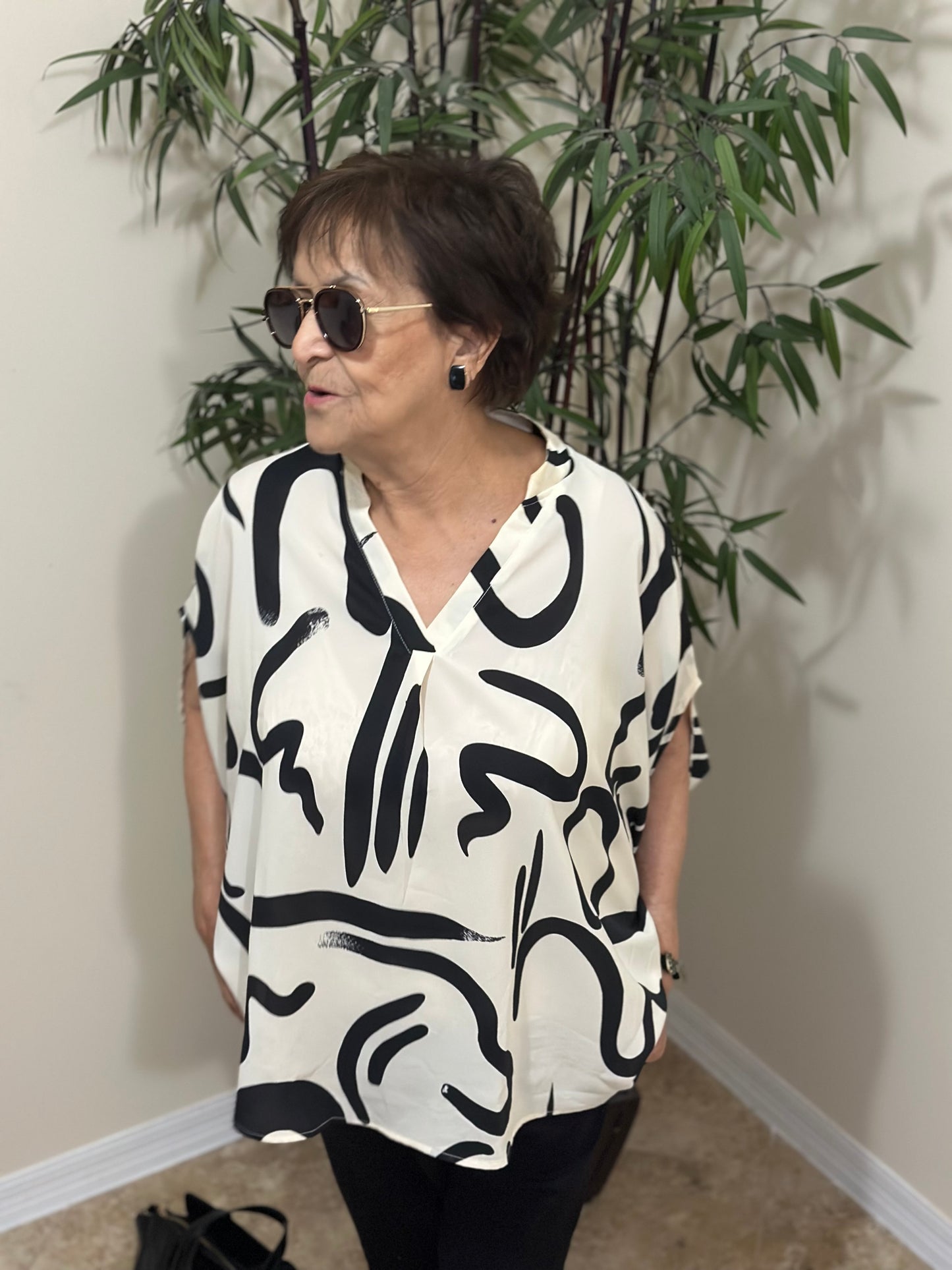 Perfee Printed Notched Half Sleeve Blouse